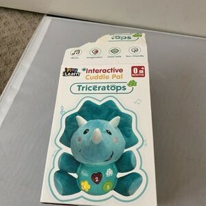 I play I learn cuddle pal baby dinosaur